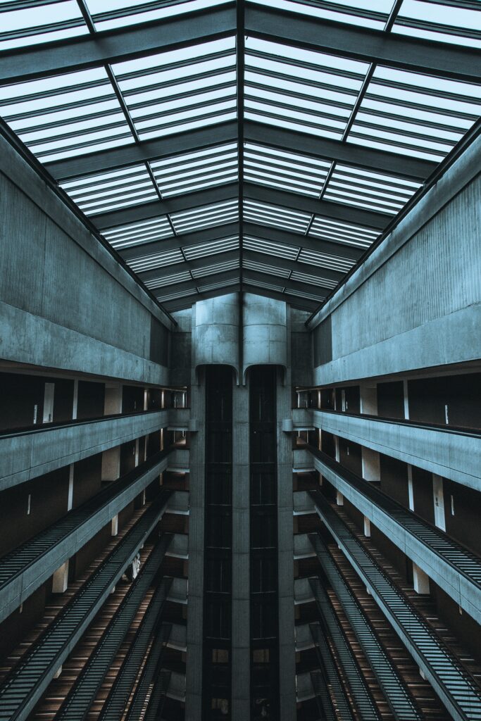 Modern Multi-Storey Building Wallpaper: Geometric Gray Design