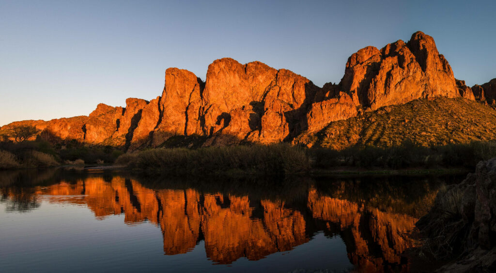 Stunning Arizona Rock Reflections at Sunset - Serene Wallpaper Background