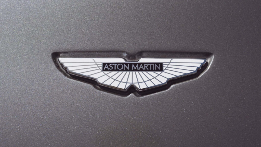 Stunning Aston Martin Logo Wallpaper: Elegance for Car Enthusiasts