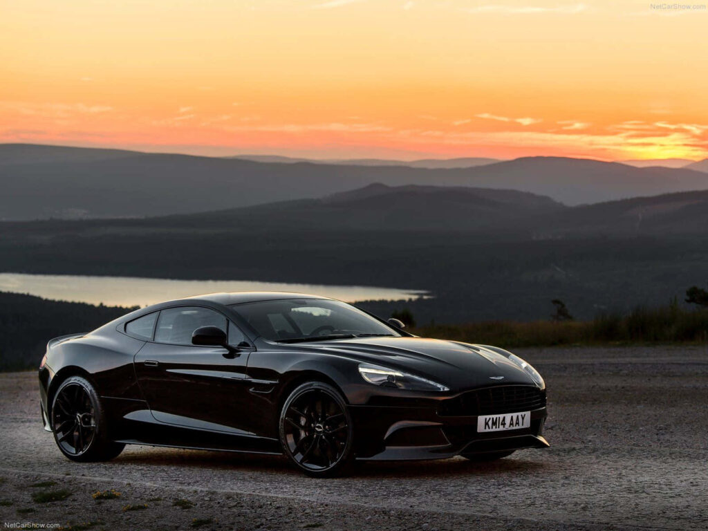 Stunning Aston Martin Vanquish Wallpaper Against Sunset Hills