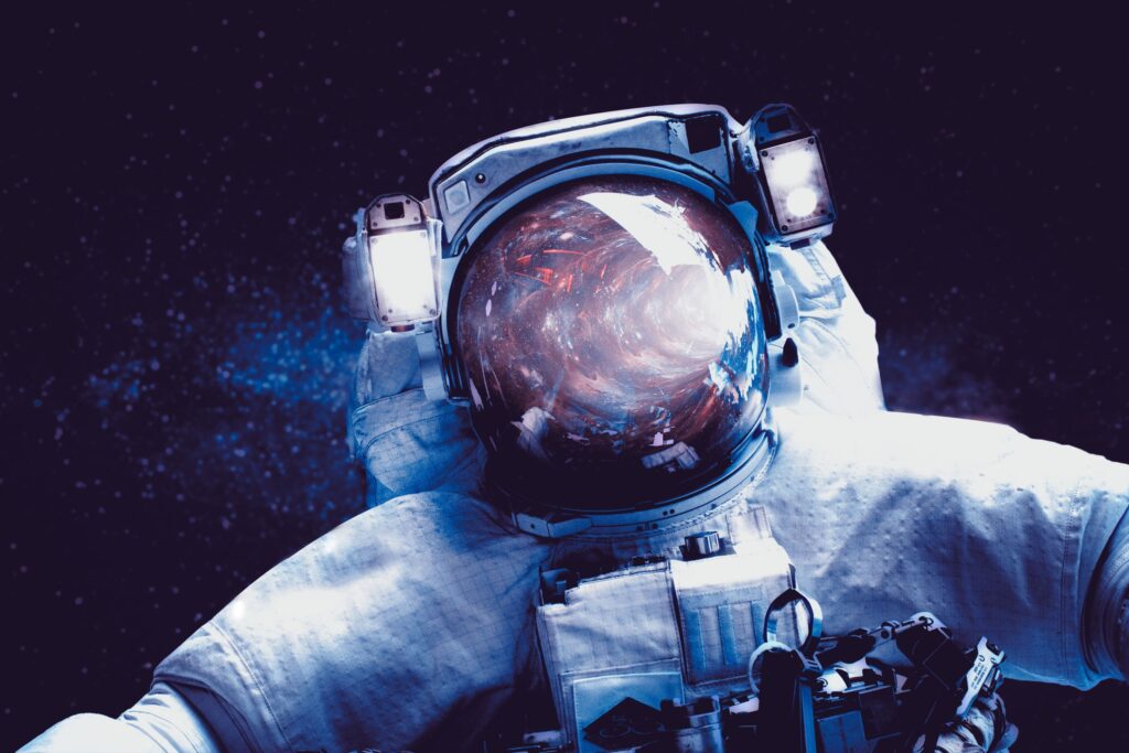 Stunning Astronaut Wallpaper: Galaxy Reflection in Dark Space