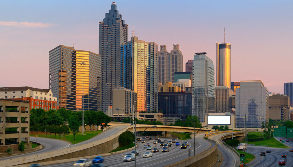 Stunning Atlanta Skyline Sunset Wallpaper: Iconic Skyscrapers in Gold