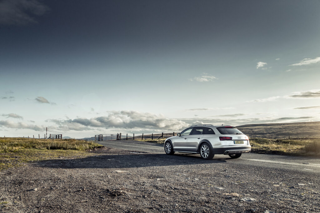 Stunning Silver Audi A6 Avant Quattro: Elegance in Scenic View Wallpaper