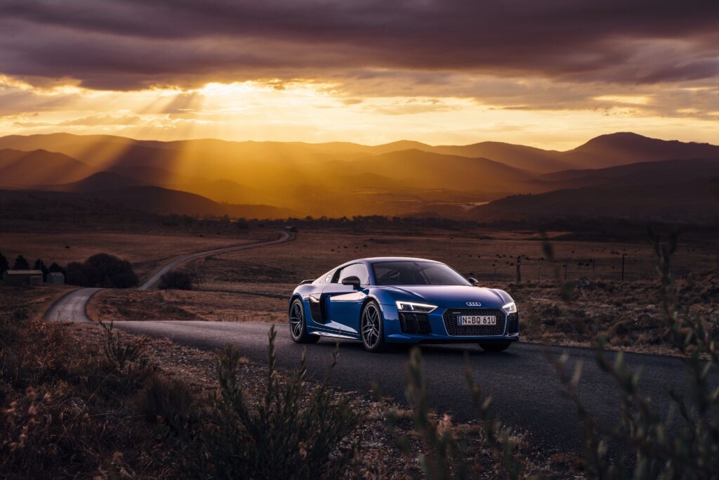Audi R8 V10 Wallpaper: Sunset on a Winding Road