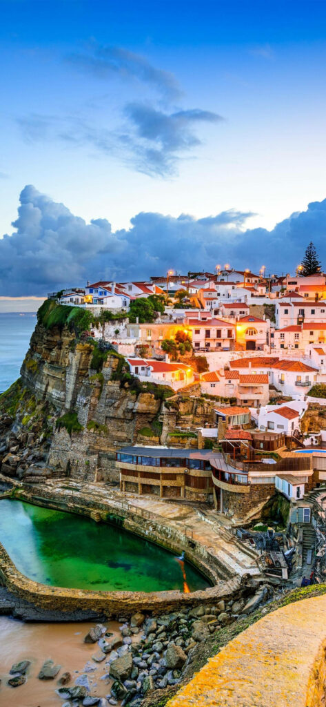 Stunning Azenha do Mar Beach Wallpaper: Cliffs & Tranquil Waters