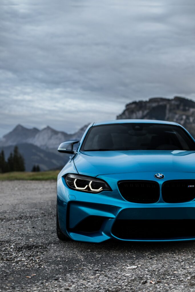 Stunning Blue BMW M2 Wallpaper Against Mountain Landscape