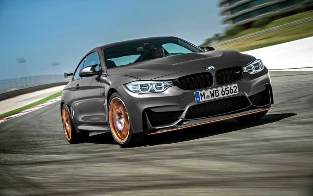 BMW M4 GTS F82 in Motion: High-Performance Racetrack Wallpaper
