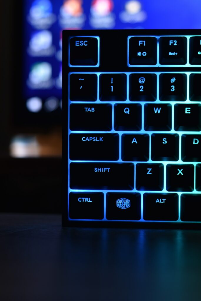 Glow of the Backlit Keyboard: Modern Tech Wallpaper Background