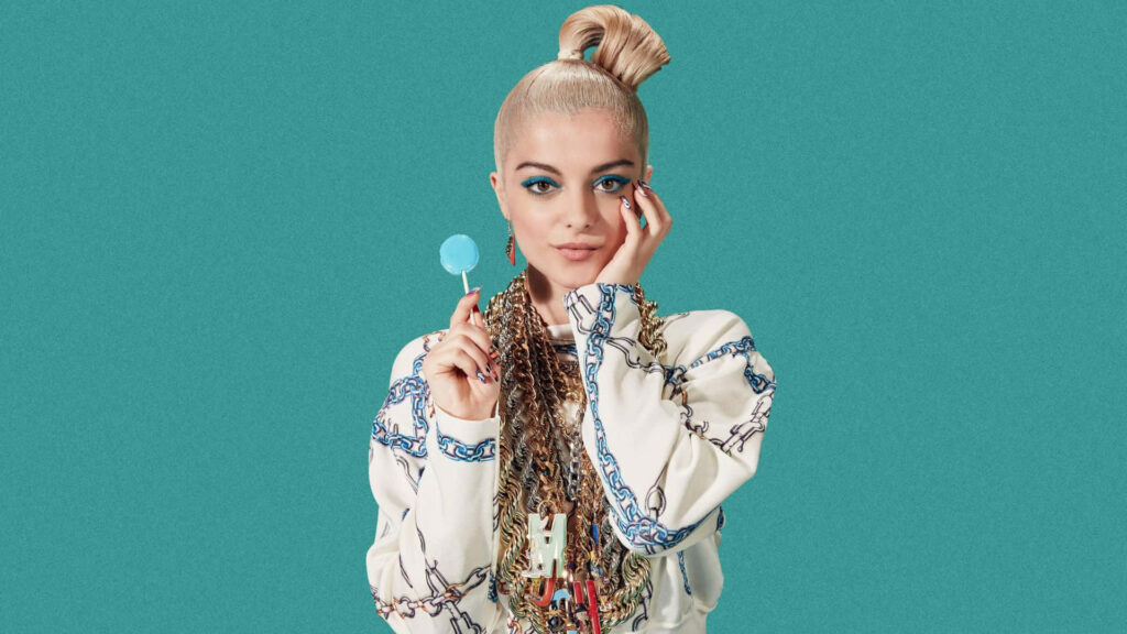 Stunning Bebe Rexha Wallpaper: Confidence & Charm in Vibrant Style