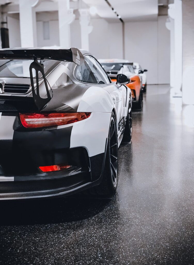 Stunning Black Sports Car Wallpaper: Aerodynamic Rear View Design
