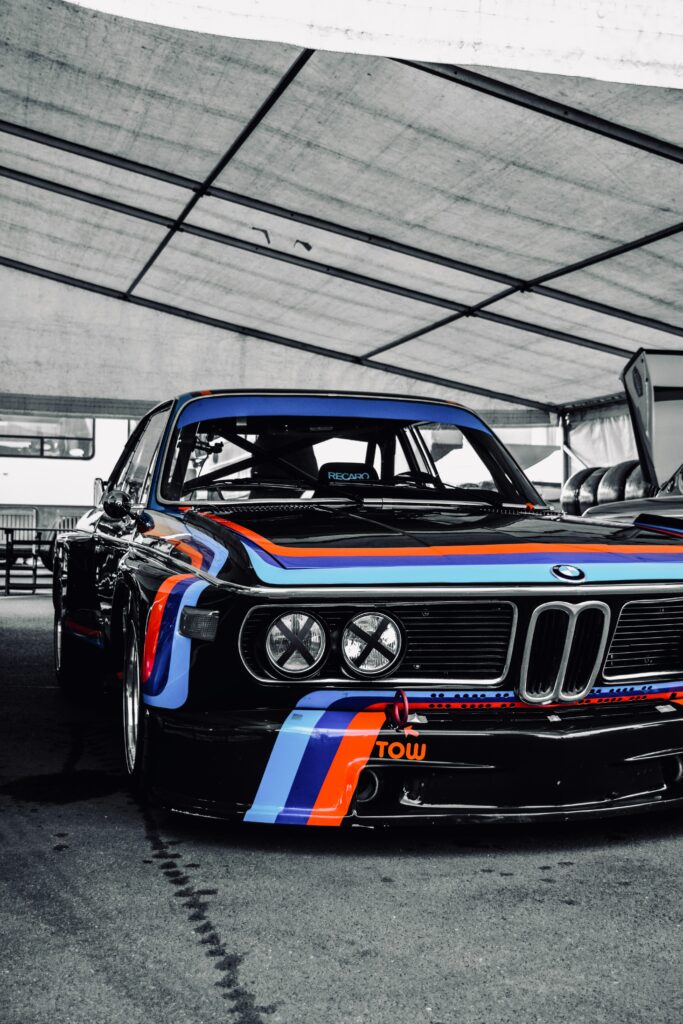 Stunning Black Tuned Automobile Wallpaper with Racing Stripes