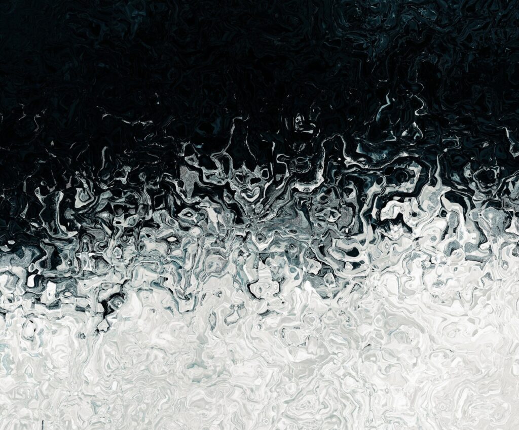 Dynamic Black and White Abstract Wallpaper with Fluid Texture