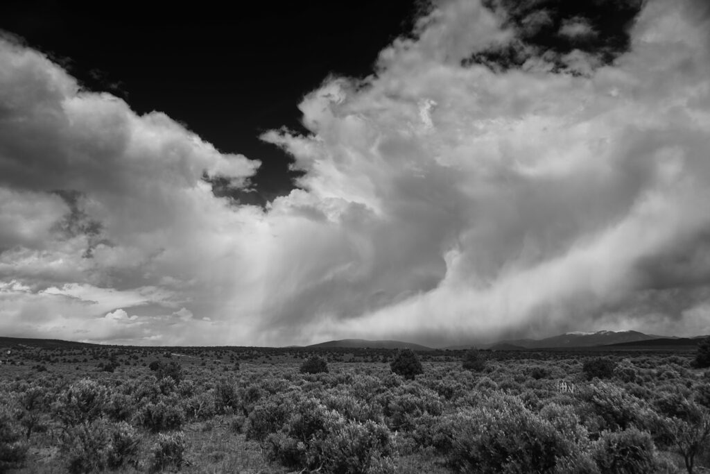 Stunning Black and White Landscape Wallpaper with Fluffy Clouds