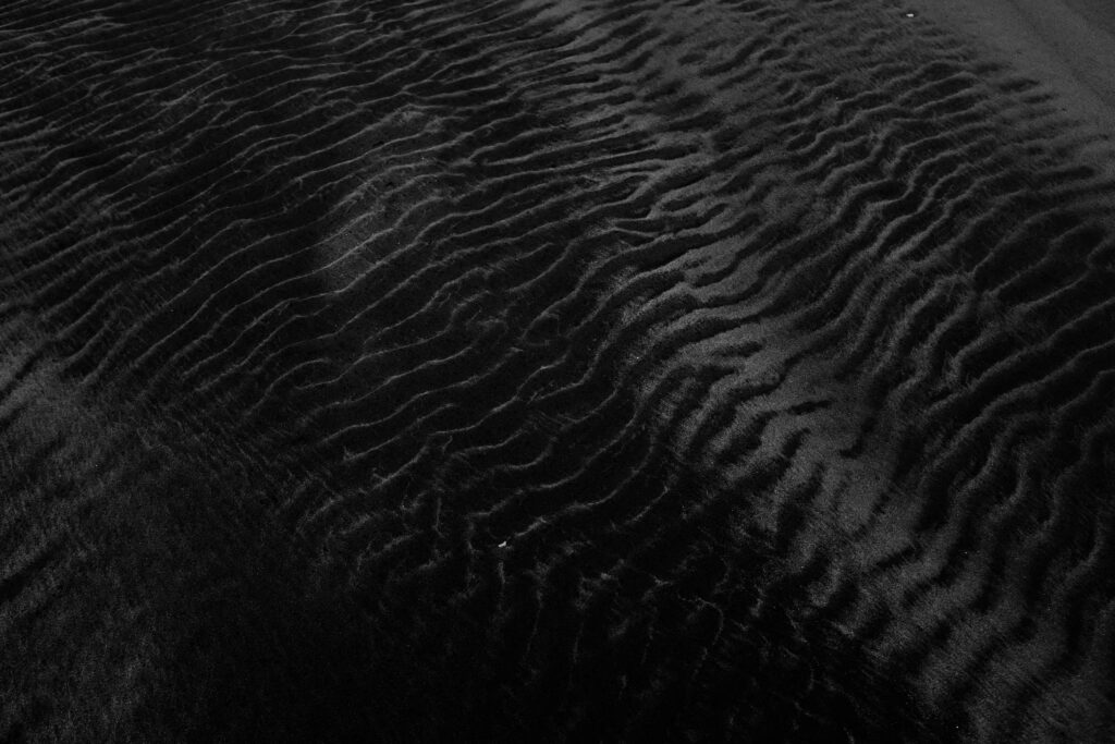 Stunning Black and White Sand Ripple Close-Up Wallpaper Background