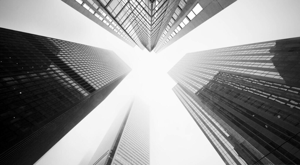 Stunning Black-and-White Worm's-Eye View Skyscraper Wallpaper