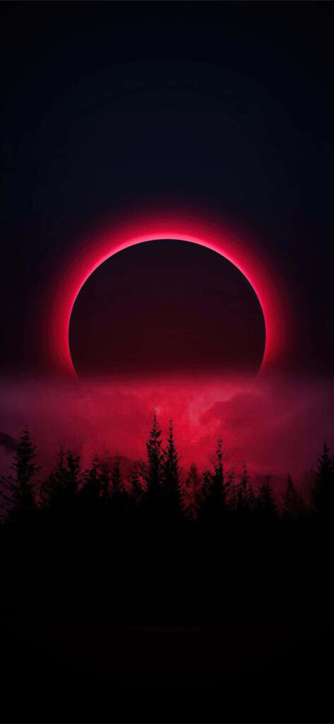 Blood Moon Eclipse Wallpaper: Intense Red Glow Over Dark Forest