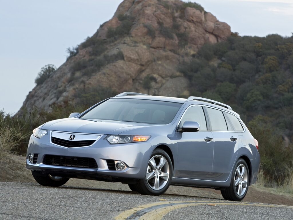 Stunning Blue 2010 Acura TSX Front View on Asphalt Road Wallpaper