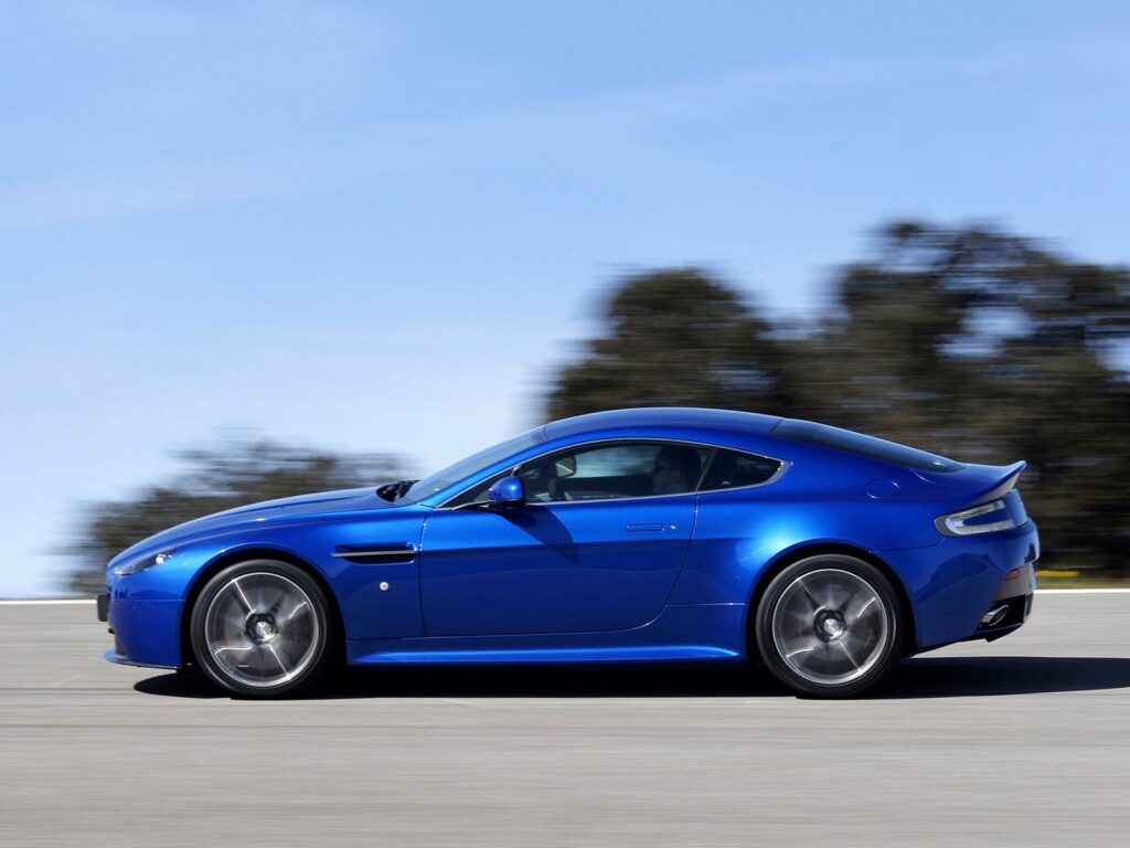 Blue 2011 Aston Martin V8 Vantage in Motion - Stunning Wallpaper