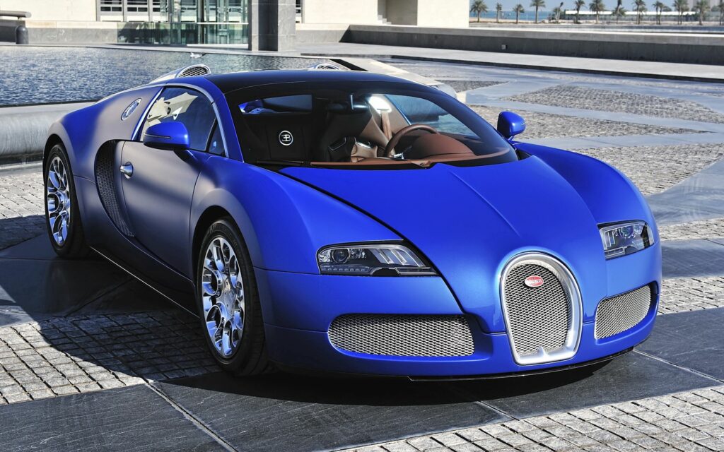 Stunning Blue Bugatti Veyron: Front View of Iconic Supercar Wallpaper