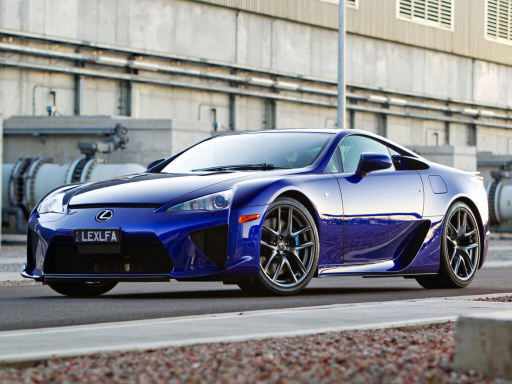 Stunning Blue Lexus LFA Against Industrial Backdrop - Elegant Design Wallpaper