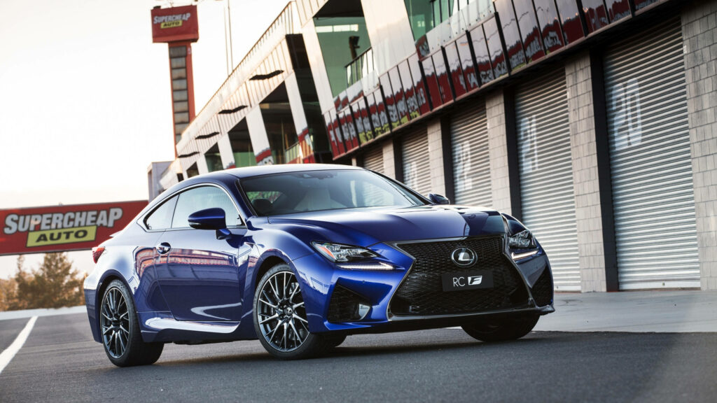 Sleek Blue Lexus RC F Wallpaper with Supercheap Auto Sign