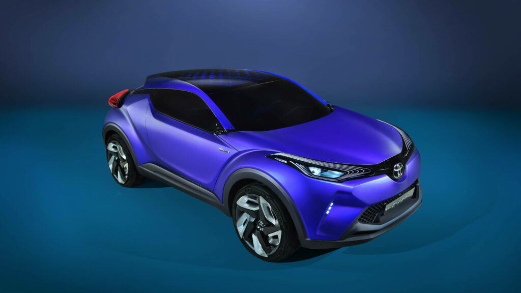 Brilliant blue Toyota CH-R 4K wallpaper showcasing sleek modern design and bold curves