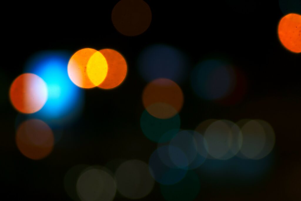Stunning Bokeh Lights Wallpaper for an Enchanting Dark Background