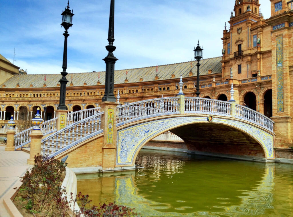 Ornate Bridge Wallpaper: Captivating Cityscape Under Clear Sky