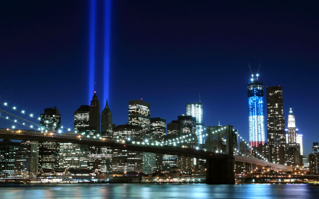 Stunning Brooklyn Bridge Night View: Illuminated Skyscrapers Wallpaper