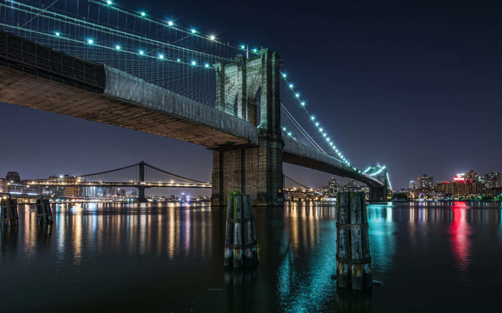 Stunning Brooklyn Bridge Night View Wallpaper with City Skyline Reflection