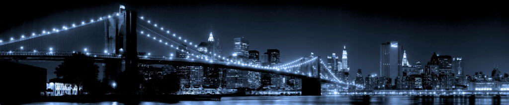 Stunning Brooklyn Bridge Night Wallpaper: Three-Screen Skyline Design