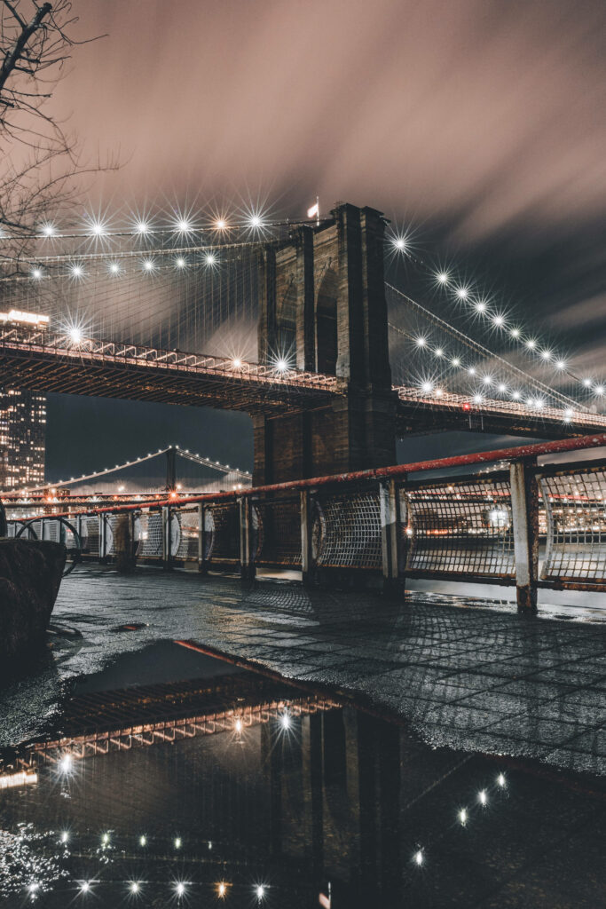 Nighttime Brooklyn Bridge Wallpaper: Illuminated Beauty & Reflection
