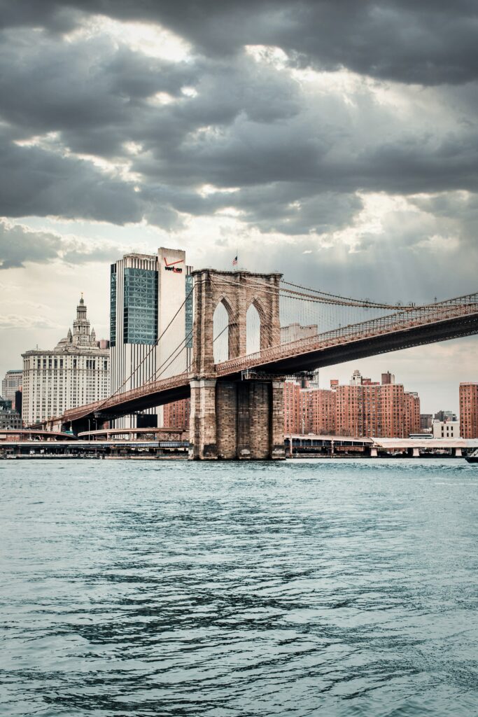Stunning Brooklyn Bridge Wallpaper: Cityscape & Dramatic Sky