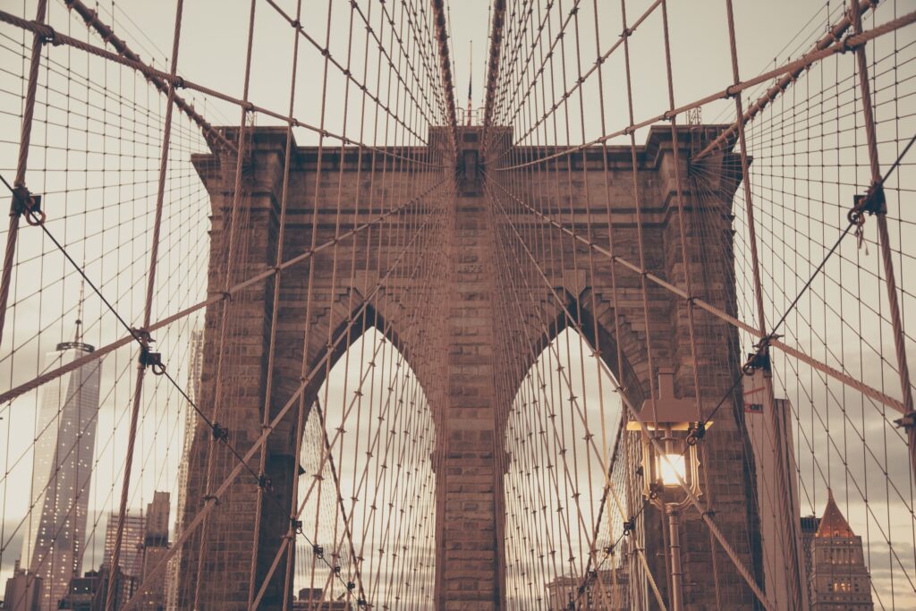 Brooklyn Bridge Wallpaper: Iconic Architecture in Warm Light
