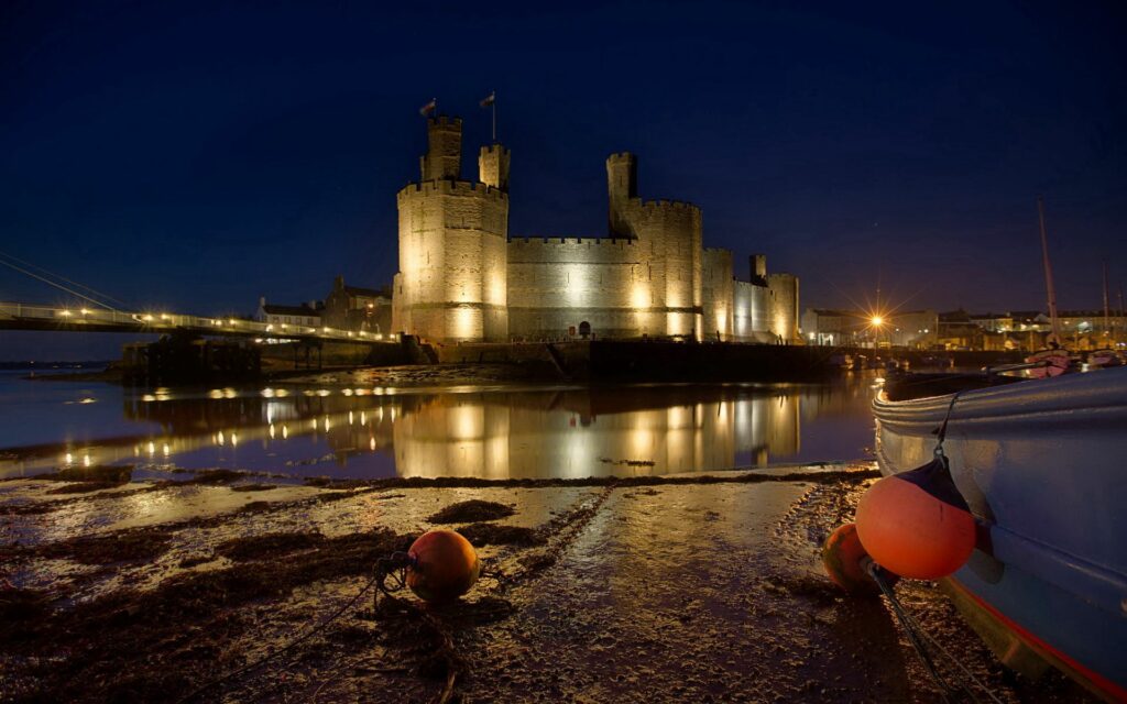Stunning Night Wallpaper of Illuminated Caernarfon Castle, Wales
