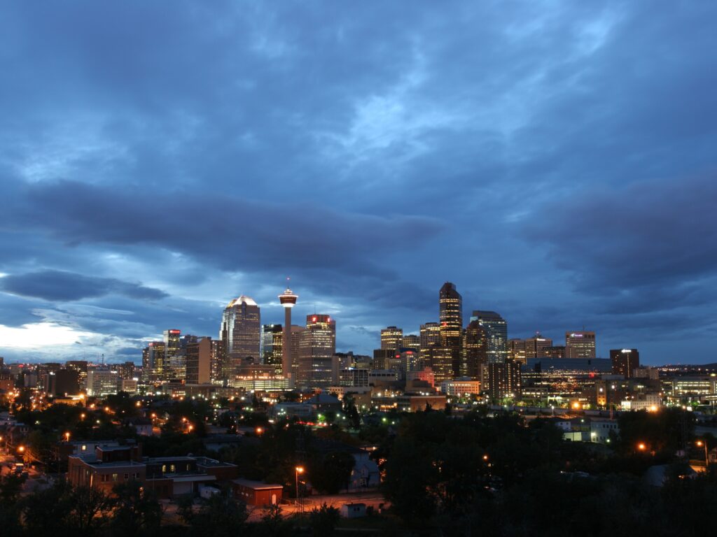 Stunning Calgary Cityscape Evening Wallpaper - Vibrant Dusk Background