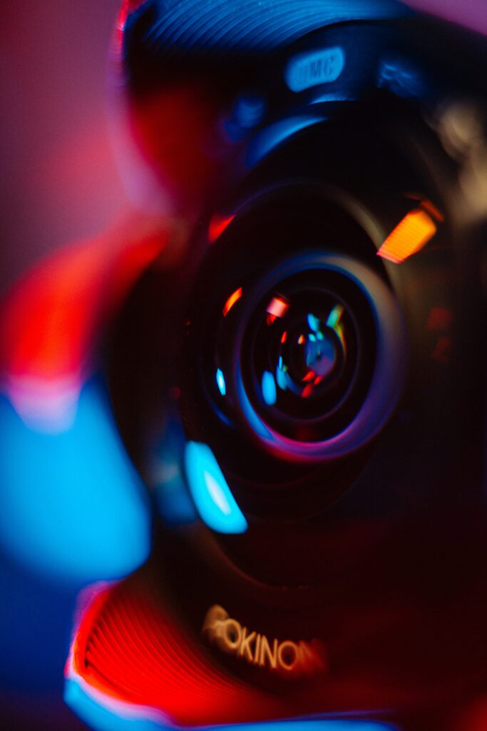 Vibrant Camera Lens Wallpaper: Colorful Glare & Artistic Background