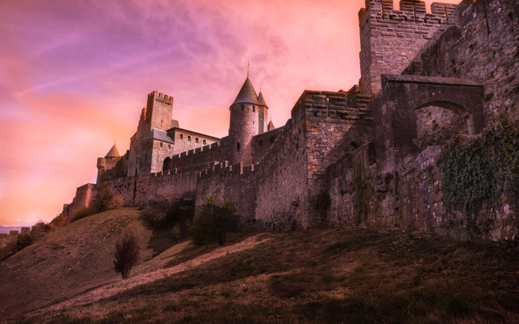 Majestic Carcassonne Wallpaper: Medieval Architecture & Pink Sky