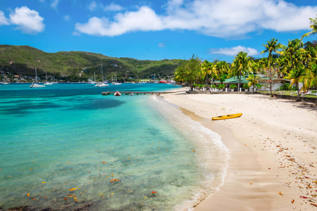 Serene Caribbean Island Wallpaper: Turquoise Waters & Palm Trees