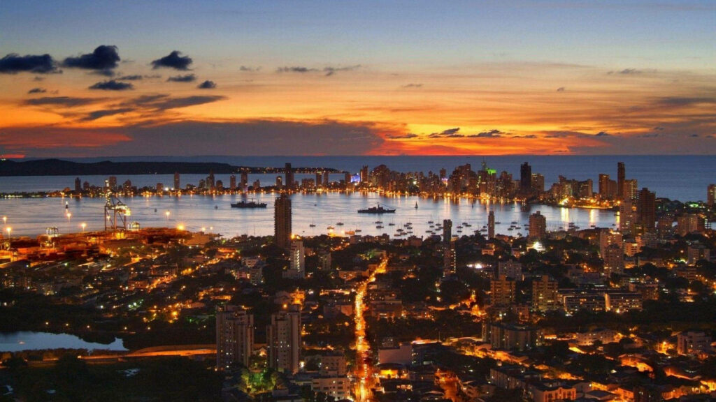 Cartagena Skyline Night: Stunning Sunset & Reflections Wallpaper