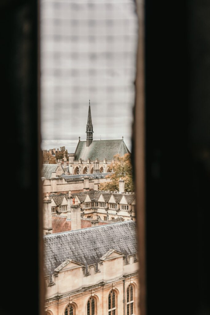 Stunning Castle Architecture Wallpaper: Elegant Design Through Window