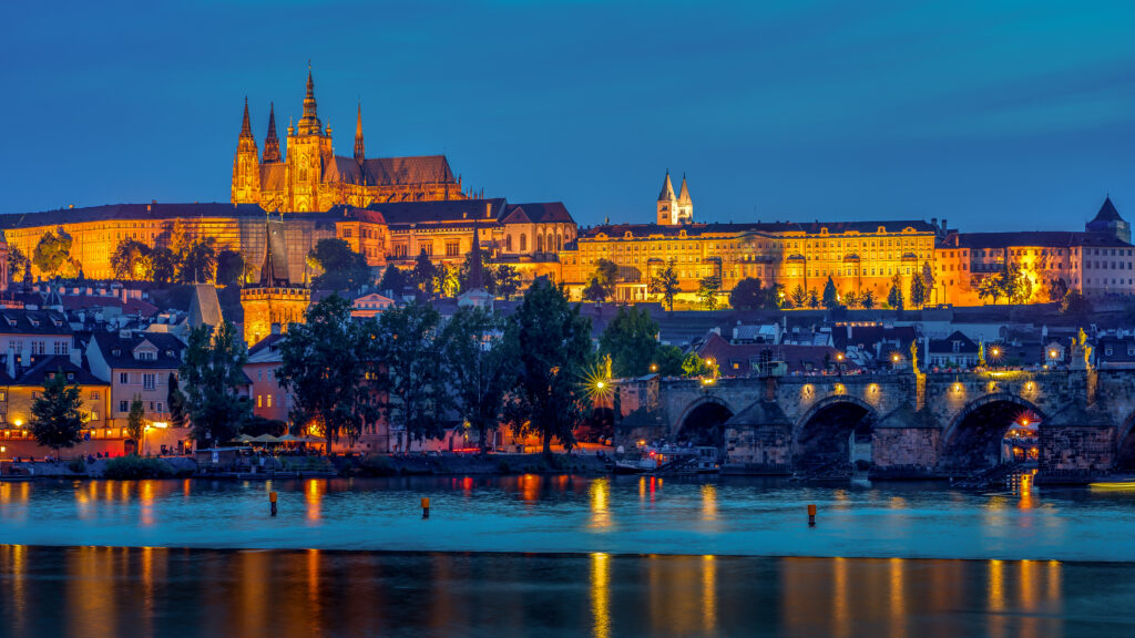 Stunning Night Castle Wallpaper: Illuminated River & City Reflection