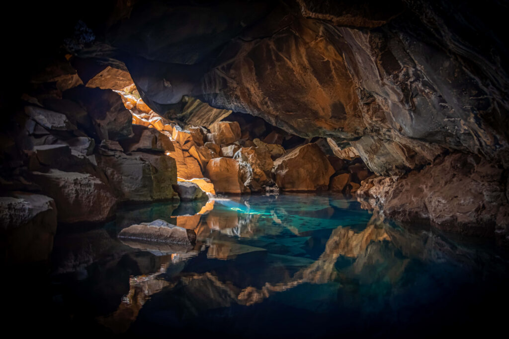 Enchanting Cave Wallpaper: Tranquil Pool & Natural Rock Beauty