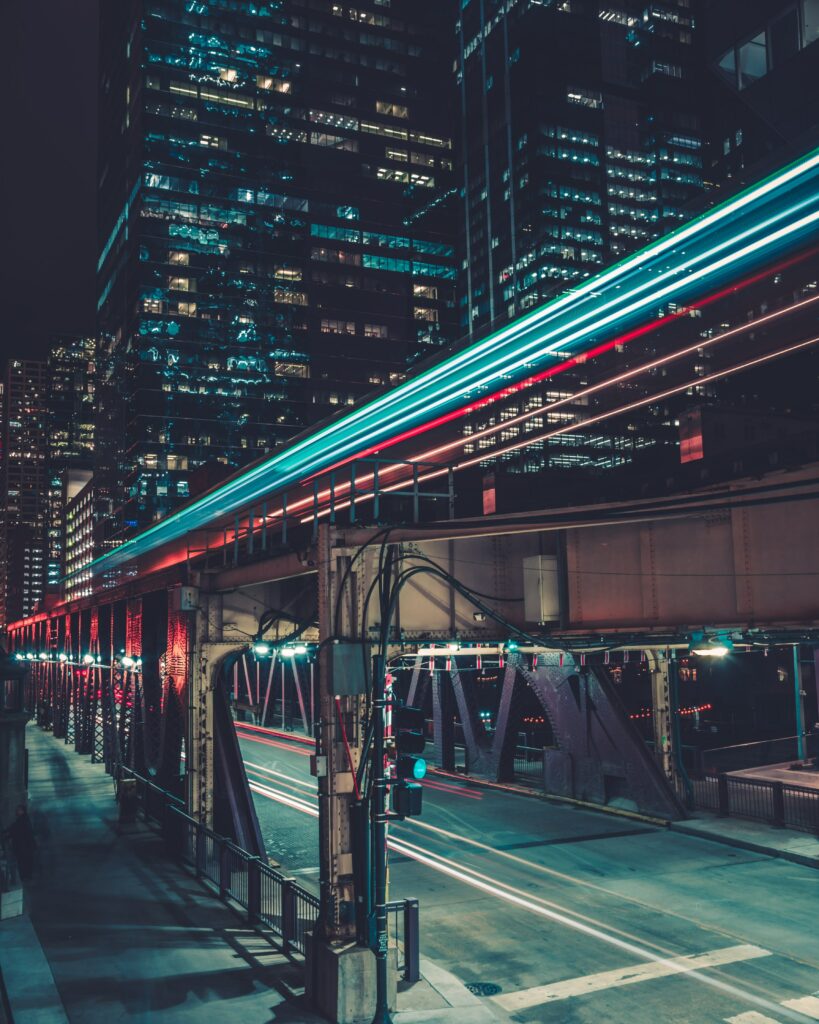 Vibrant Chicago Evening Skyline Wallpaper with Dynamic Light Trails