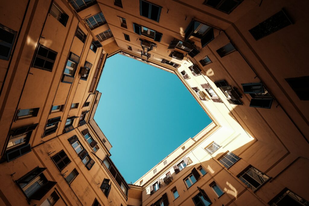 Geometric City Building Wallpaper: Stunning Bottom-Up View