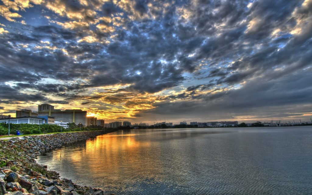 Serene City Morning Wallpaper: Dramatic Clouds & Vibrant Reflections