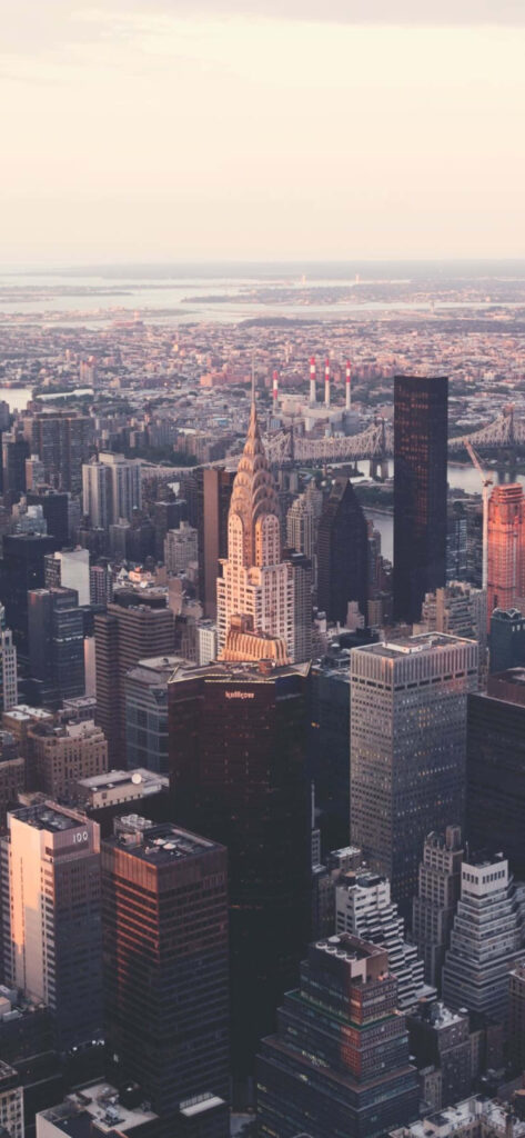 Stunning City Skyline Sunset Wallpaper: Iconic Skyscrapers & Architecture