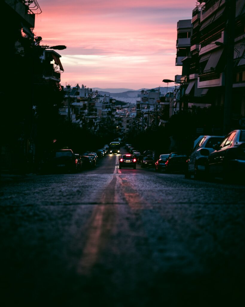 Stunning City Sunset Wallpaper: Urban Evening View & Road Markings