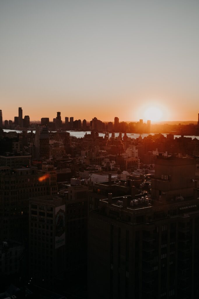 Stunning Cityscape Sunset Wallpaper: Aerial View & Serene Atmosphere