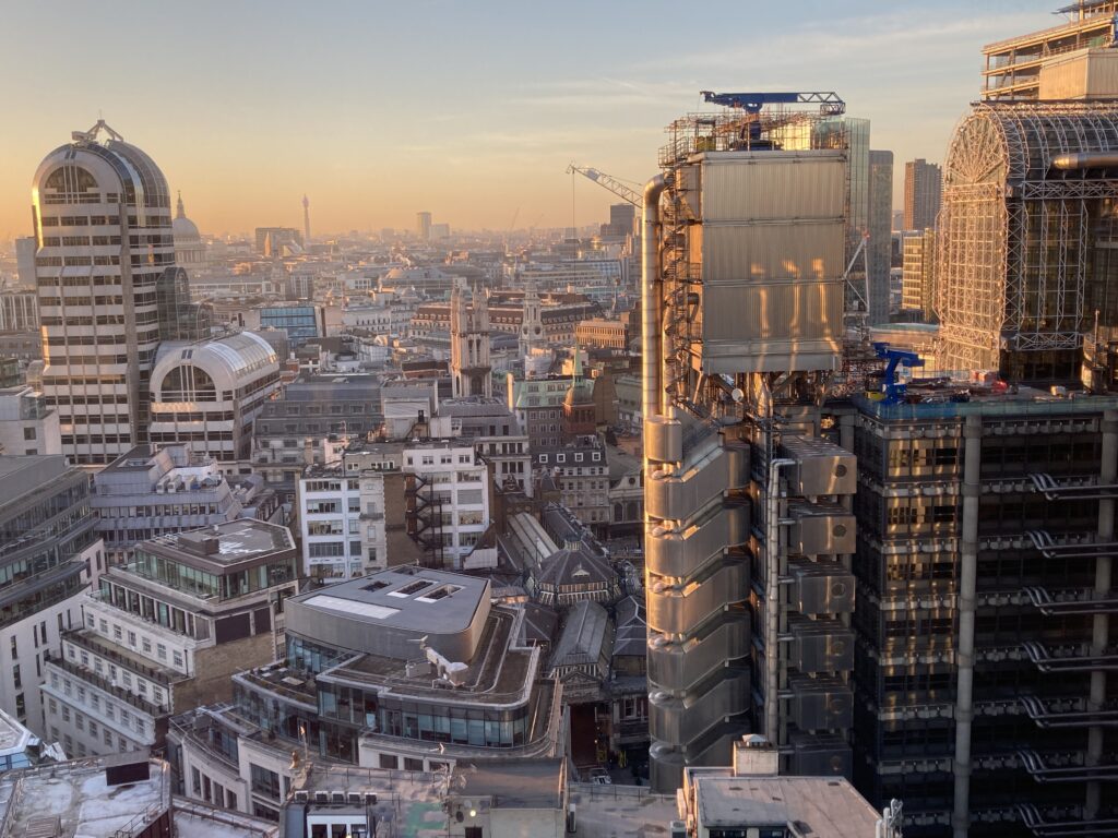 Stunning Cityscape Sunset Wallpaper: Modern & Classic Architecture